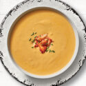 A bowl of orange soup.