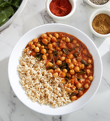 TOMATO BRAISED CHICKPEAS WITH BROWN RICE